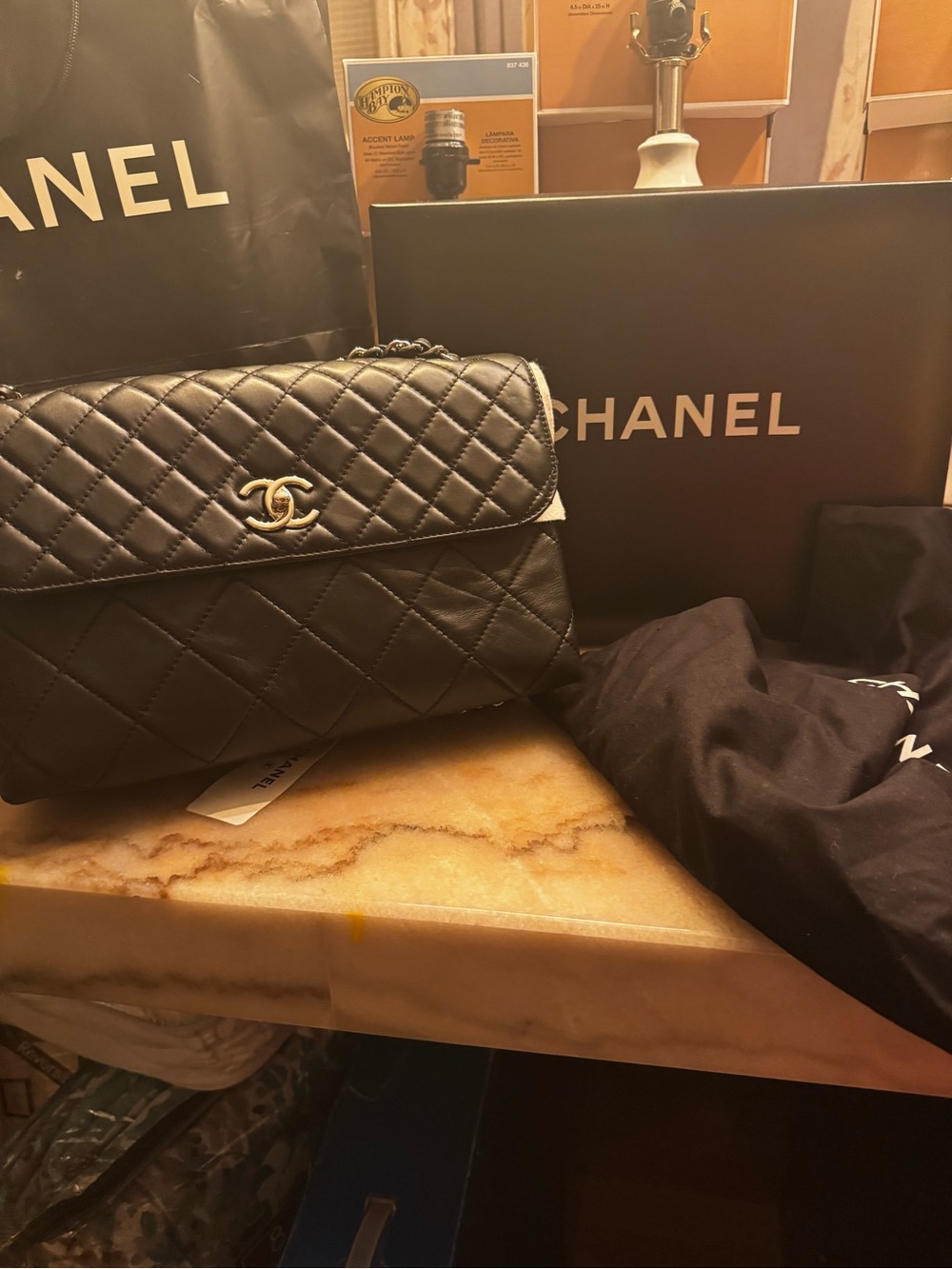 CHANEL Black Quilted Leather Shoulder Bag with Gold CC